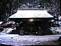 The snowy Aotama shrine precincts of a temple