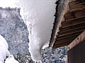 Snow which falls from a thatch roof